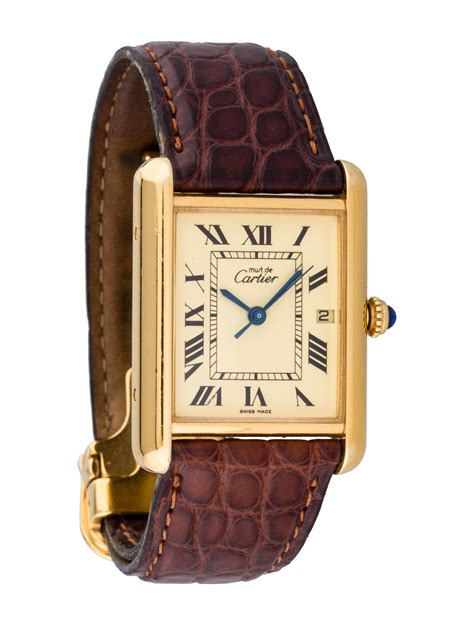 must de cartier tank watch.